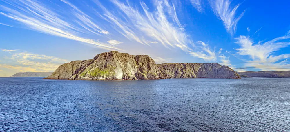 Panoramic winter view of snowy coastline and Arctic Ocean in North Cape Norway